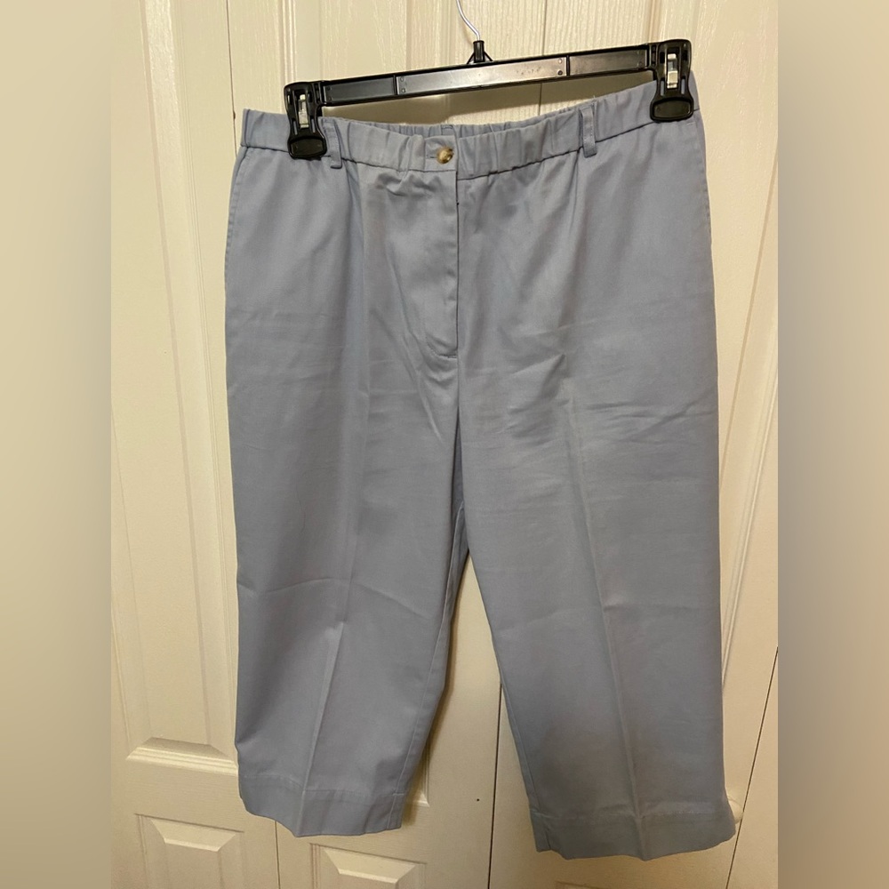 NEW LISTING!Capris in very good condition in a light blue color.Zippered front.